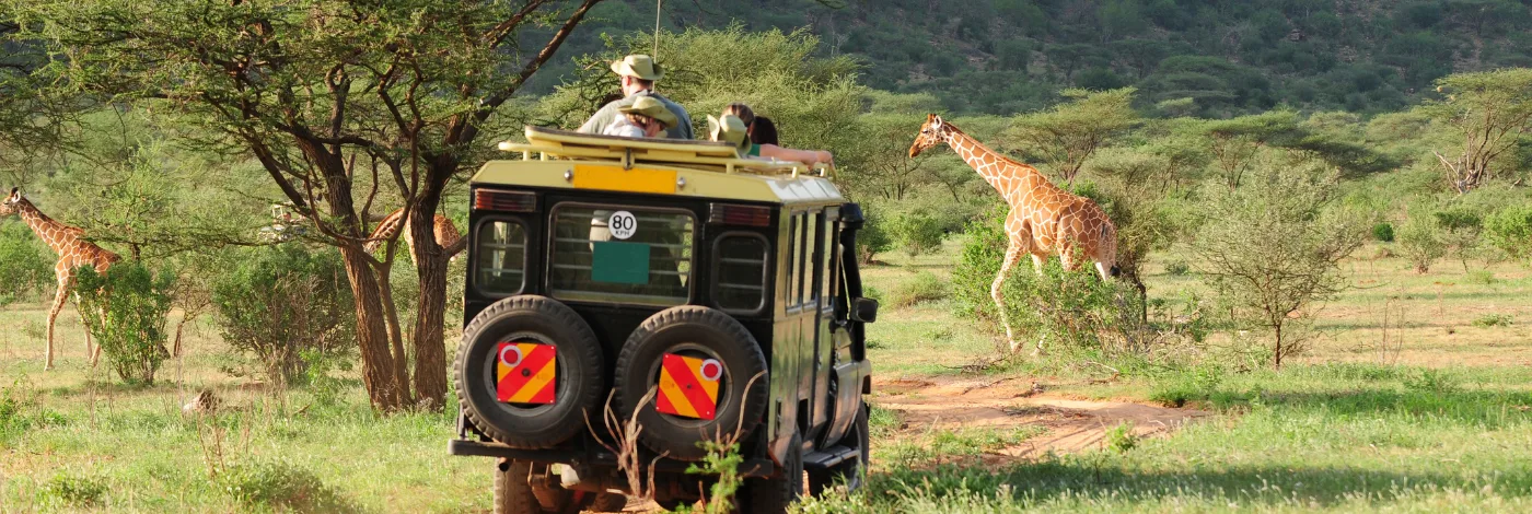 Travelshoppe travelers enjoying a Kenya safari experience