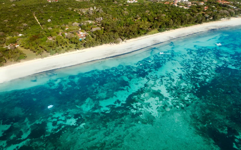 Aerial view of Diani Beach turquoise waters on the Kenya coast
