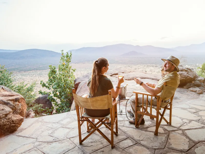 Couple enjoying a romantic safari sundowner in Kenya