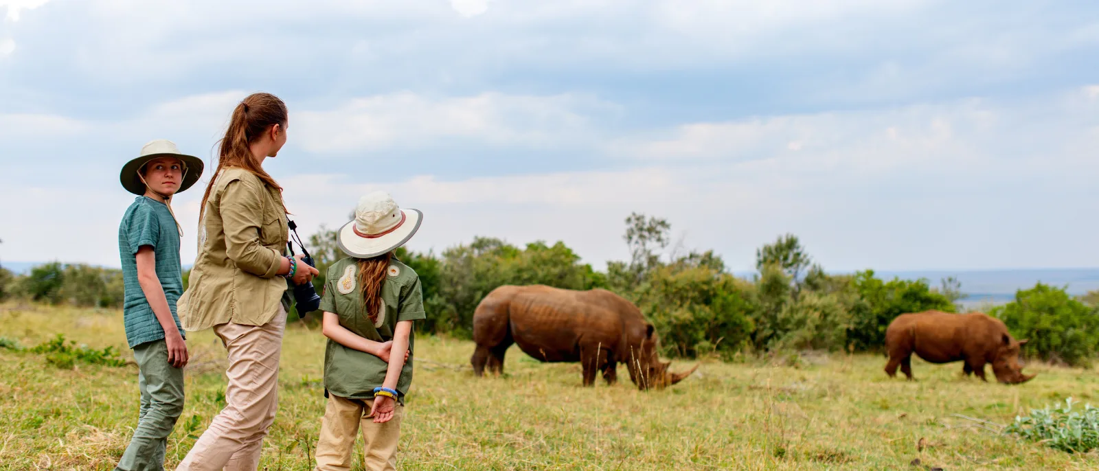 Travelshoppe safari guide with happy guests on a Kenya game drive
